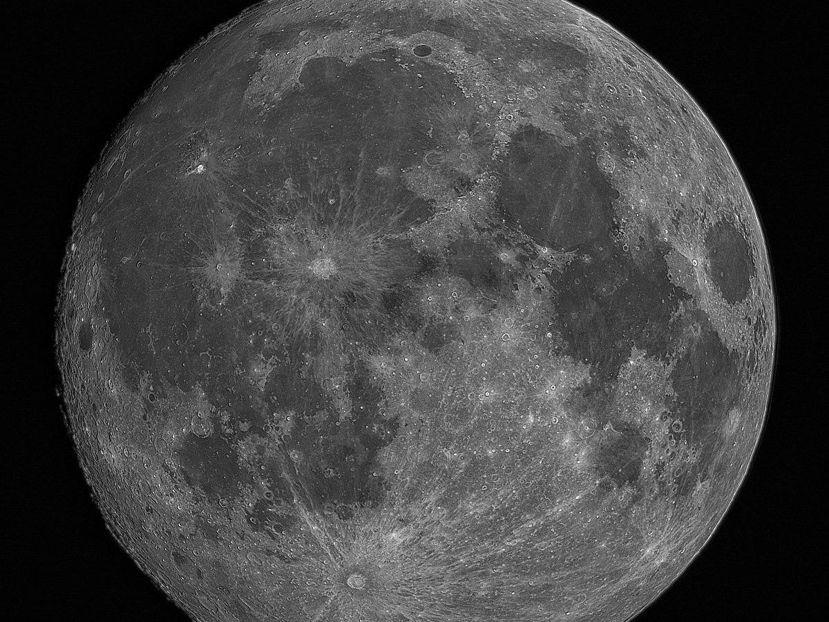 The cratered near-full moon